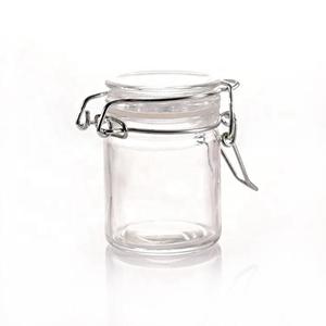 Flip top glass jar 50ml, 43mm dia.x 62mm h Flip top glass jar 50ml, 43mm dia.x 62mm h