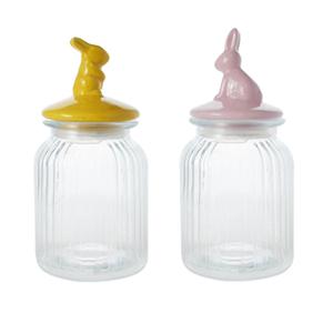 Glass storage jars with ceramic rabbit lids, 110mm dia.x 172mm h