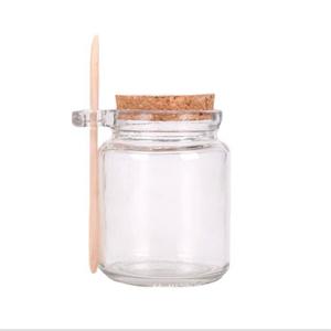 Glass jar with spoon, 78mm dia.x 137mm h Glass jar with spoon, 78mm dia.x 137mm h