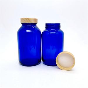 Cobalt blue glass packer bottle, 61mm dia.x 109mm h Cobalt blue glass packer bottle, 61mm dia.x 109mm h