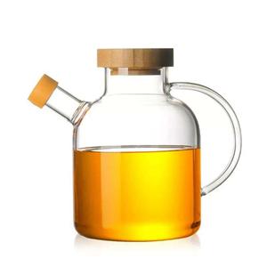 Borosilicate hygienic olive glass oil dispenser with handle bamboo lid, 100mm dia.x 140mm h